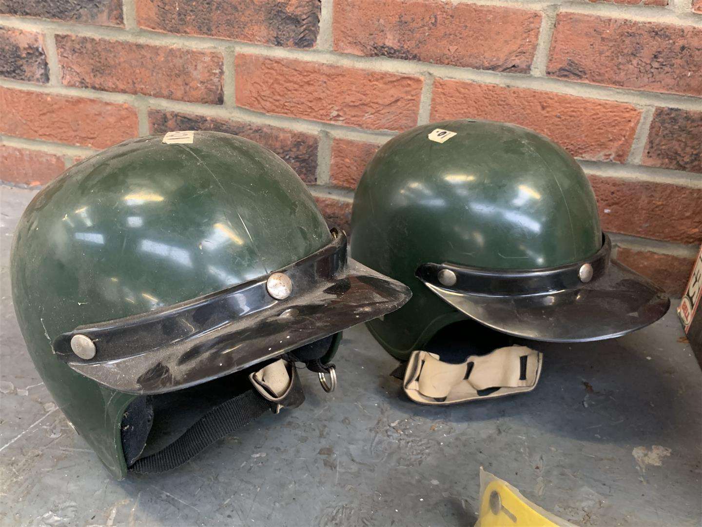 <p>4 Belgian police motorcycle helmets &amp; 25 NOS Bell visors</p>