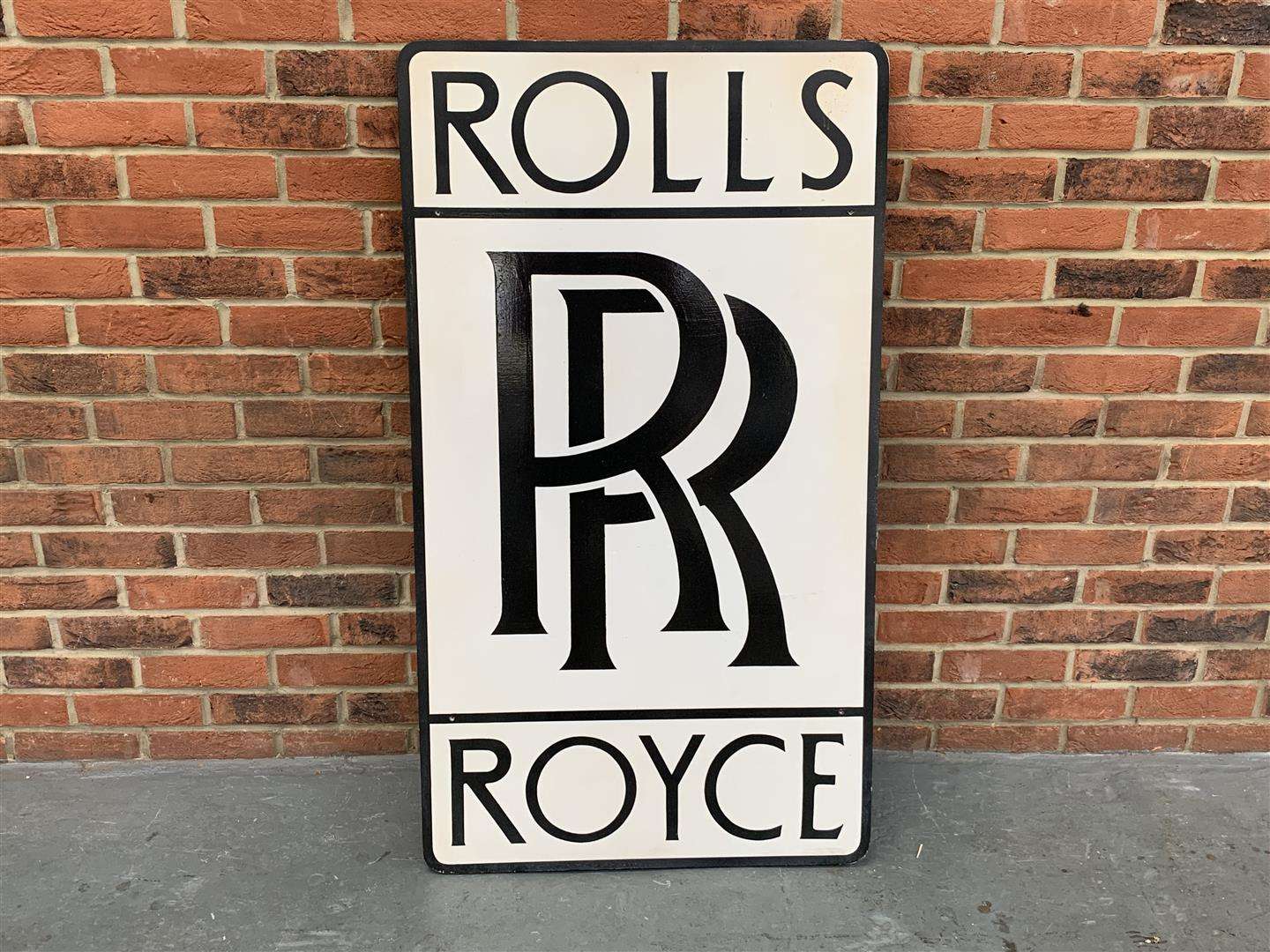 <p>Rolls Royce painted on board sign</p>
