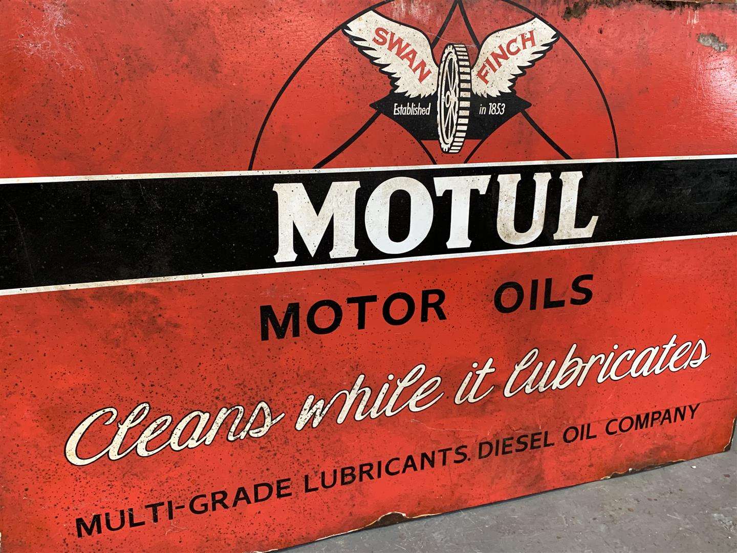 <p>Motul Motor Oils sign on board</p>