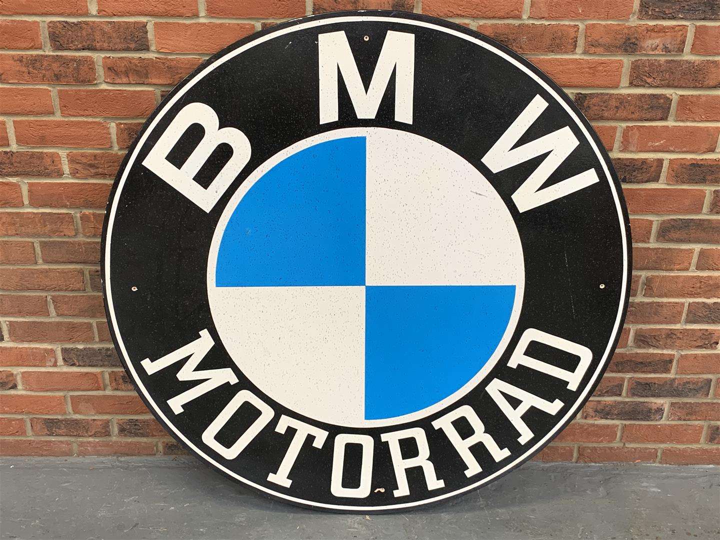<p>BMW Motorrad emblem painted on board</p>