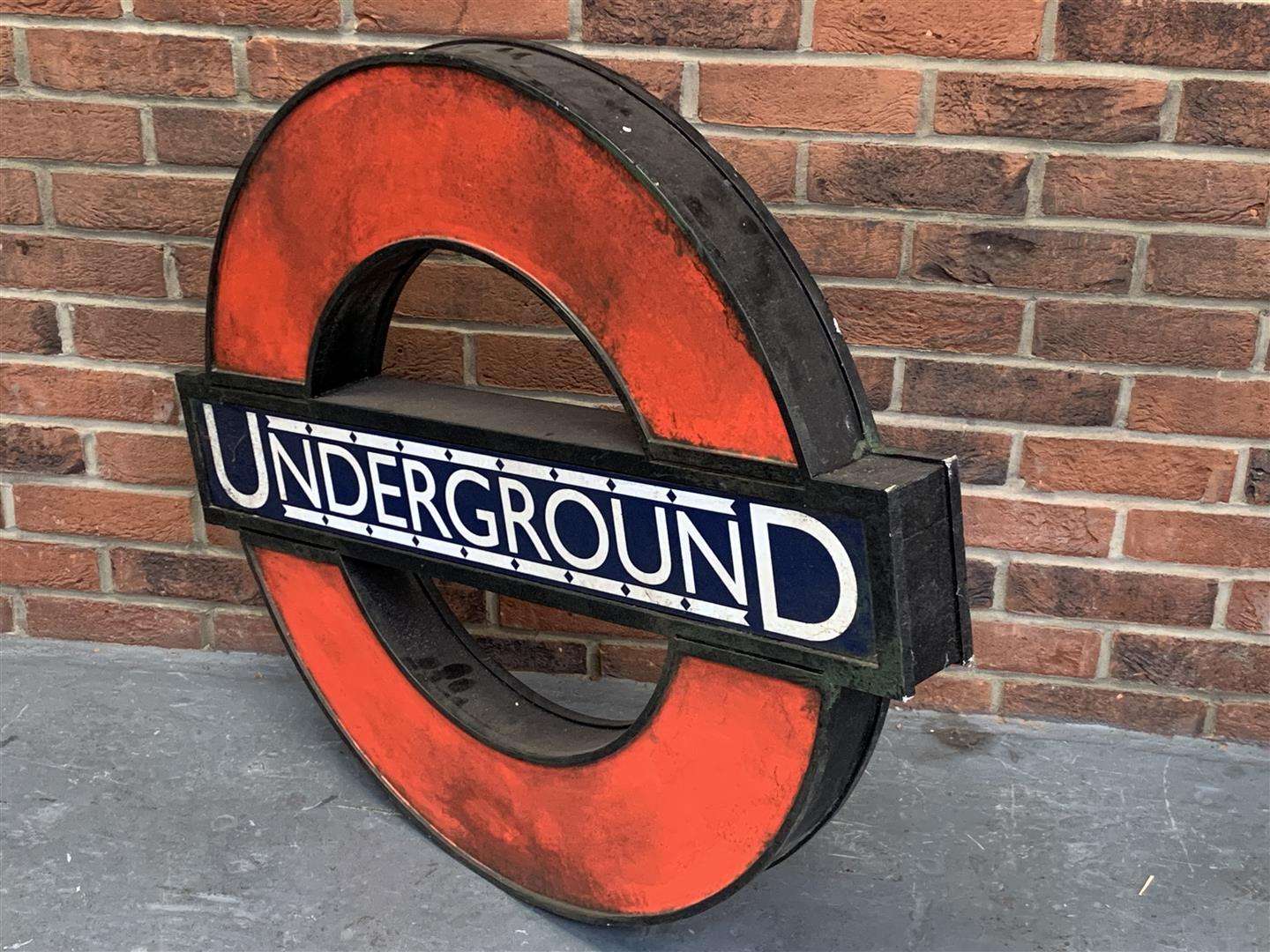 <p>Underground Sign Painted On Board</p>