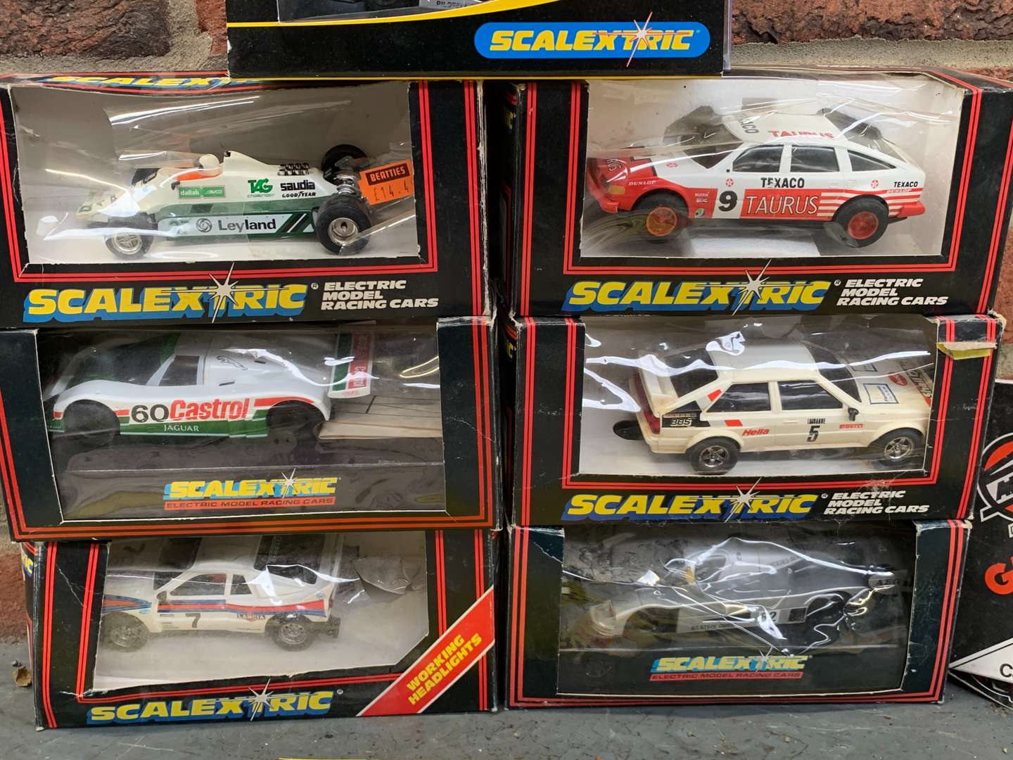 <p>7 Scalextric Model Cars &amp; Airfix Kits</p>