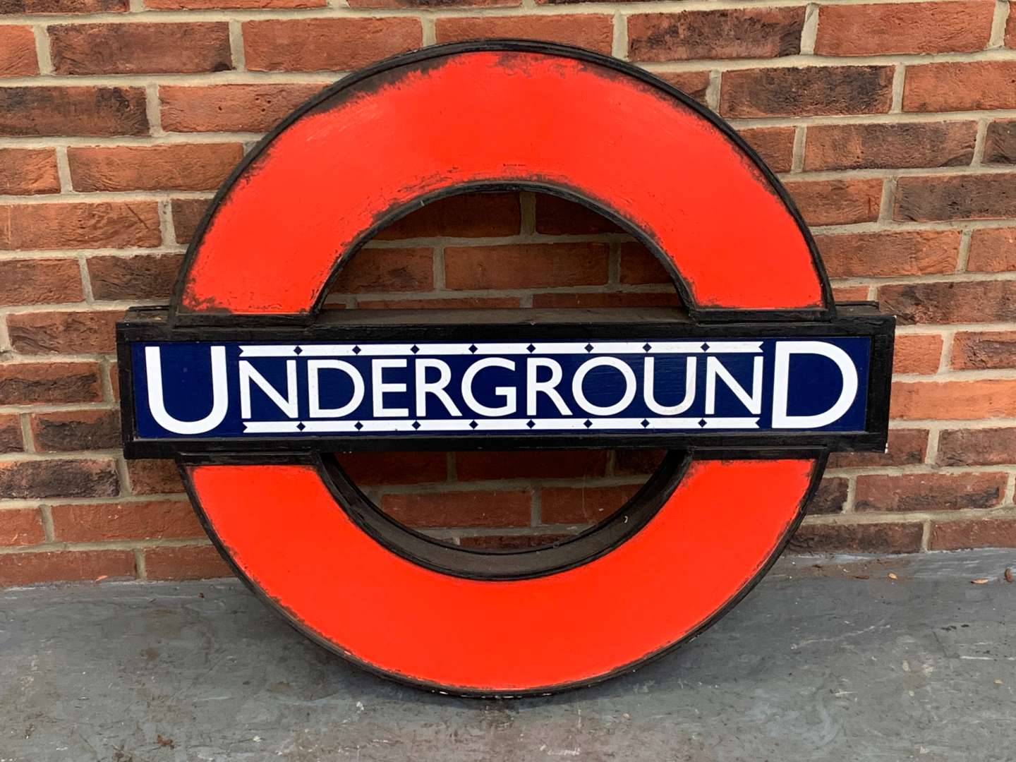 <p>Underground Sign Painted On Board &nbsp;</p>