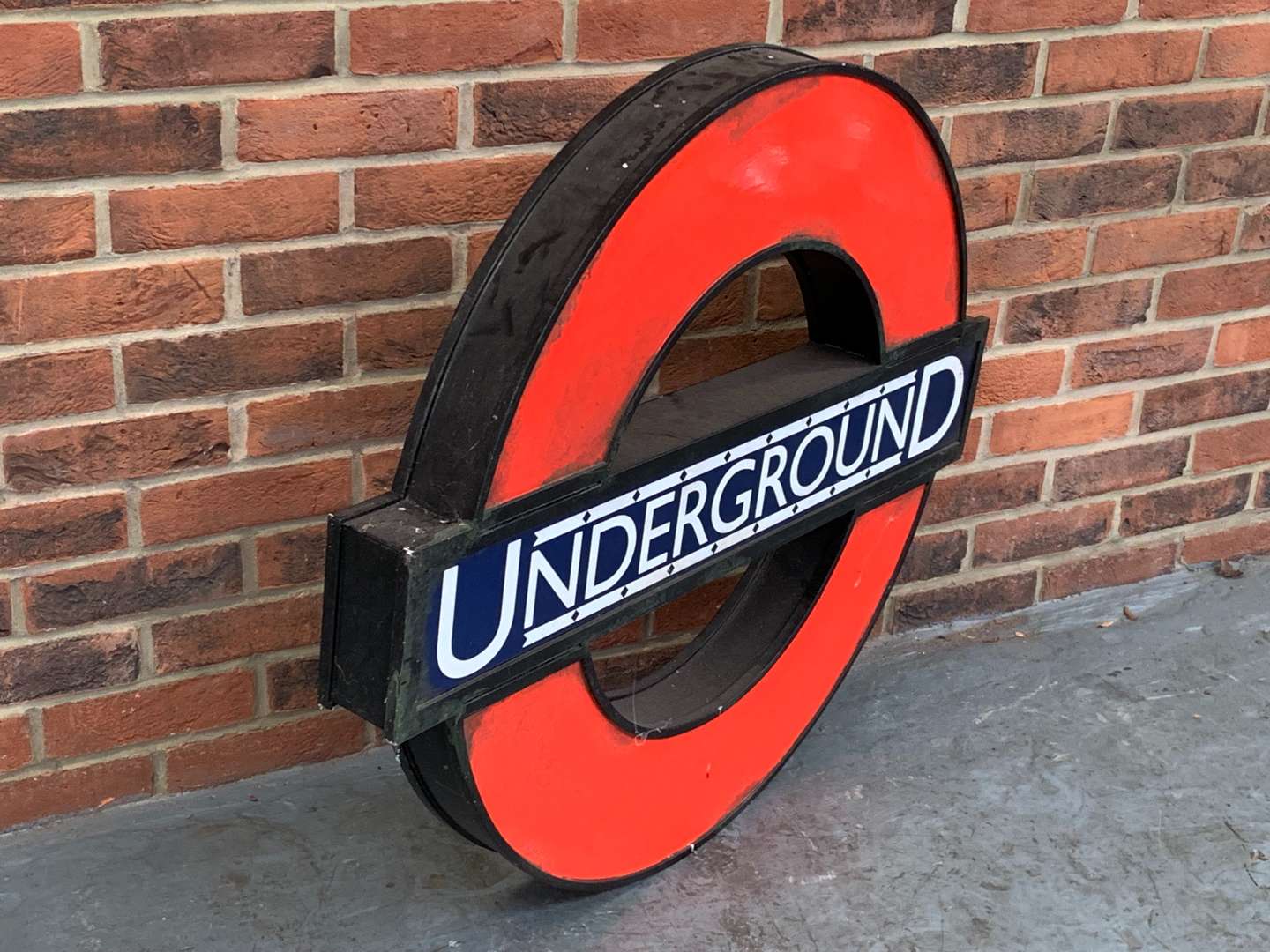 <p>Underground Sign Painted On Board &nbsp;</p>