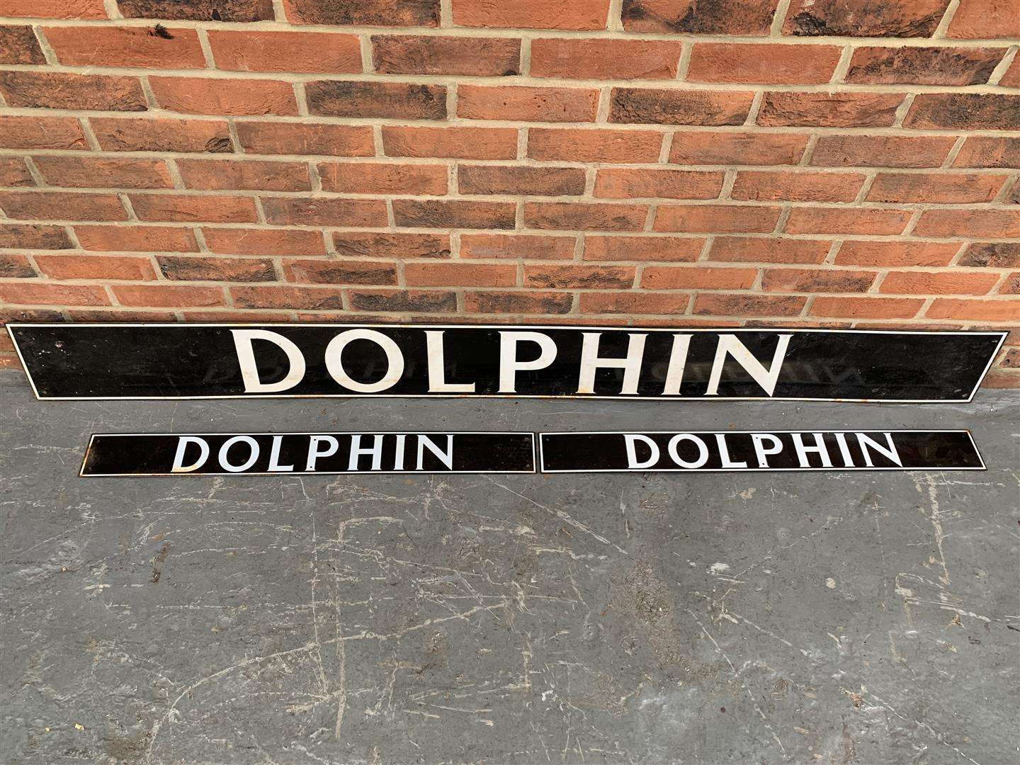 <p>Three Enamel Dolphin Signs</p>