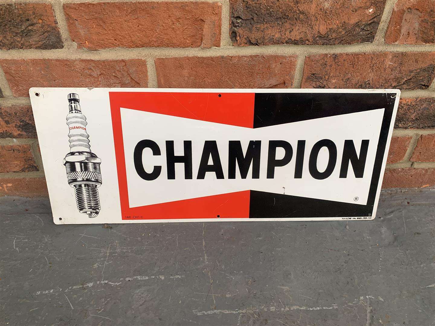 <p>Aluminium Champion Spark Plug Sign&nbsp;</p>