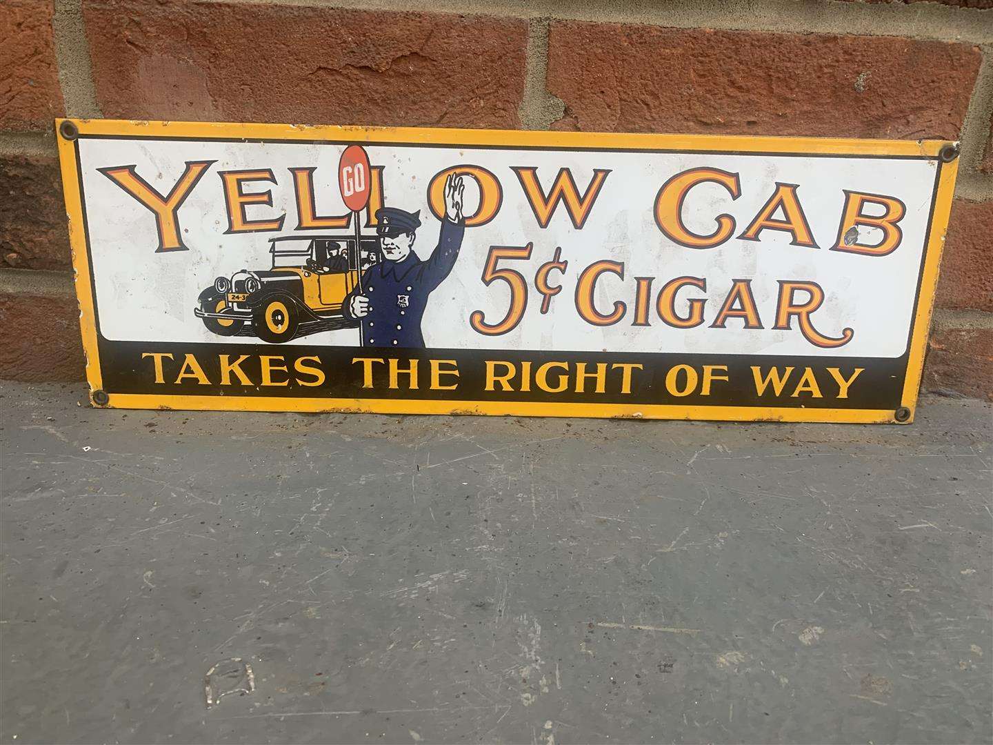 <p>Enamel Yellow Cab Sign</p>