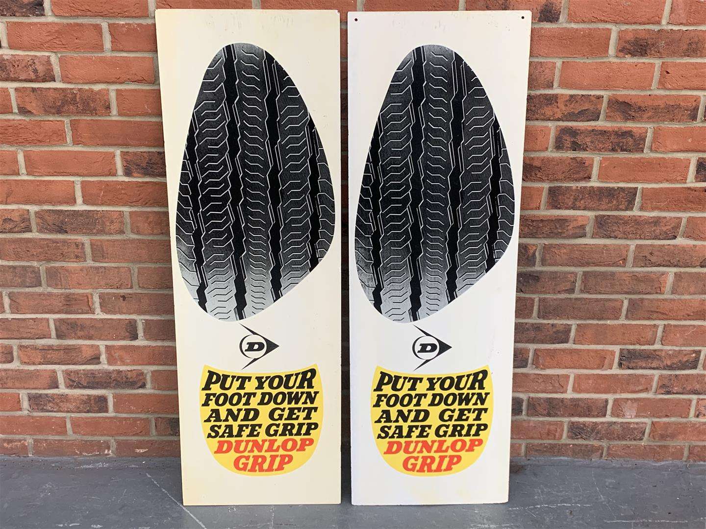 <p>Two Dunlop Tyre Signs On Board</p>
