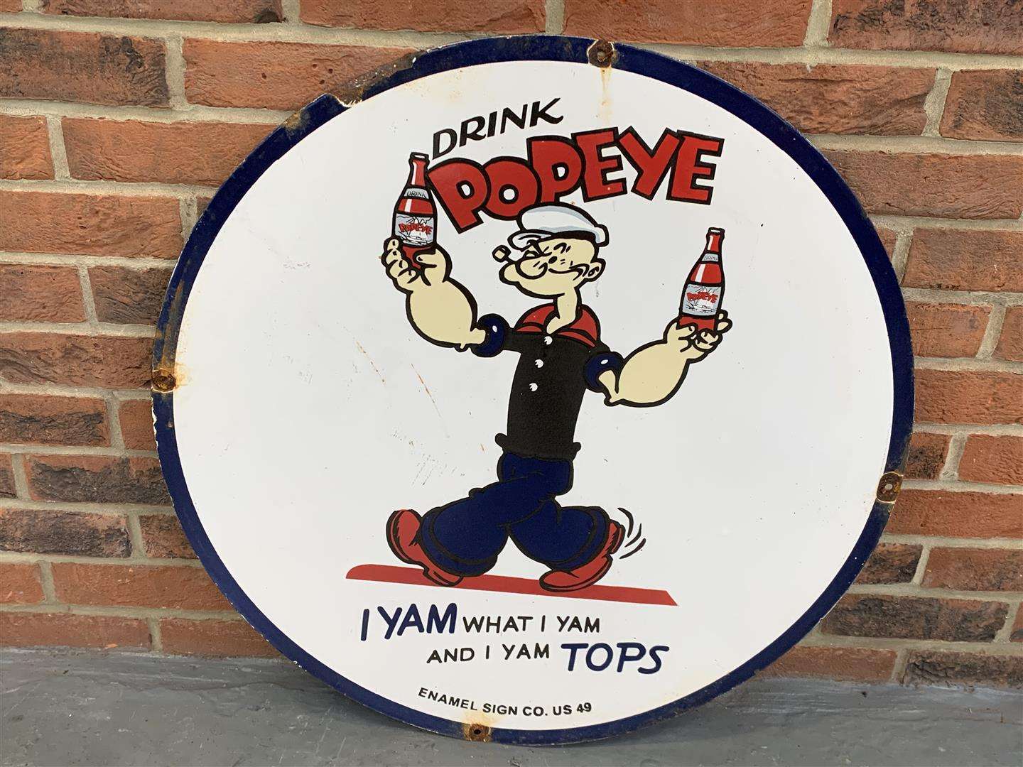 <p>Enamel Drink Popeye Sign</p>