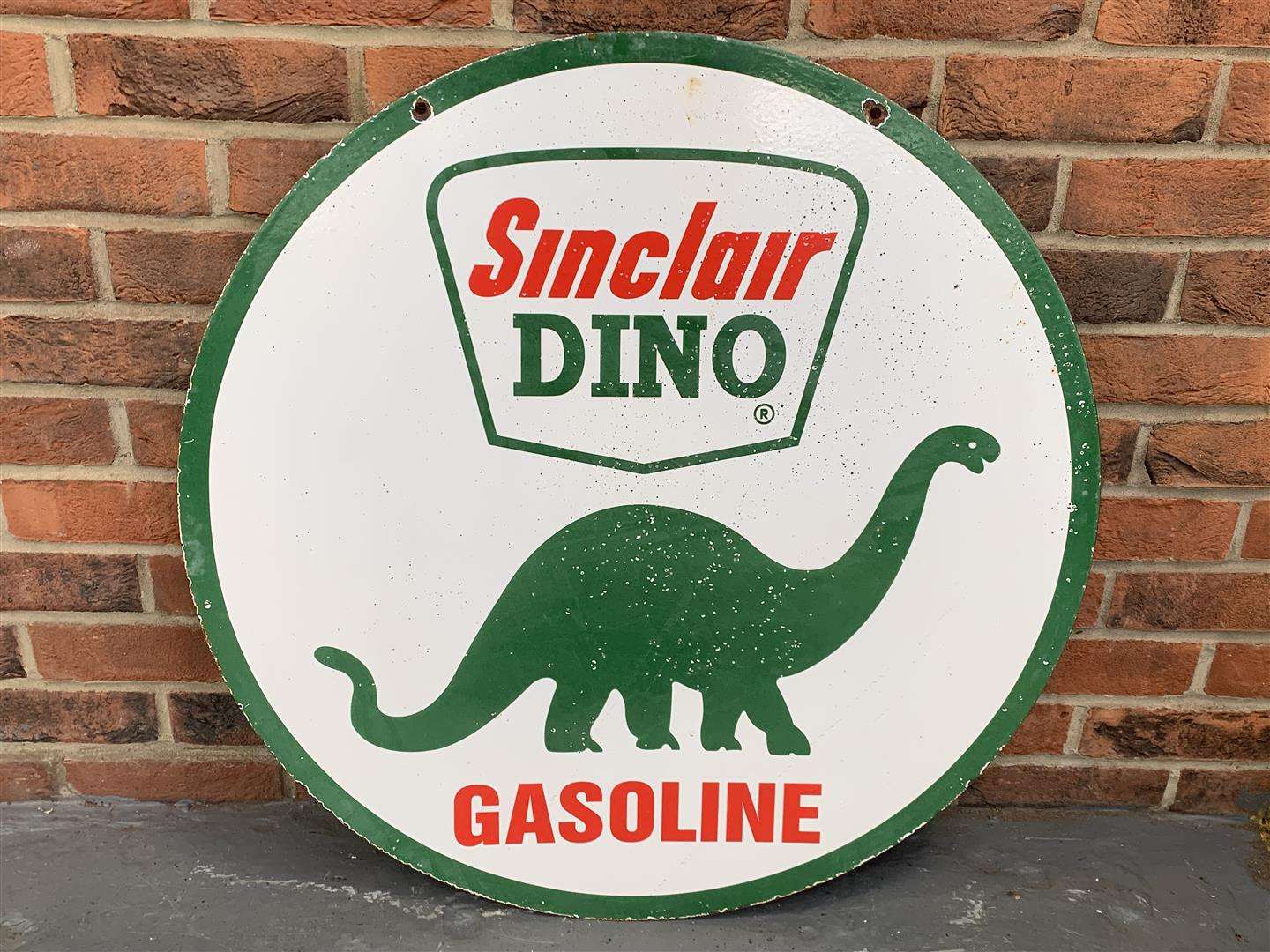 <p>Enamel Circular Sinclair Dino Gasoline Sign</p>