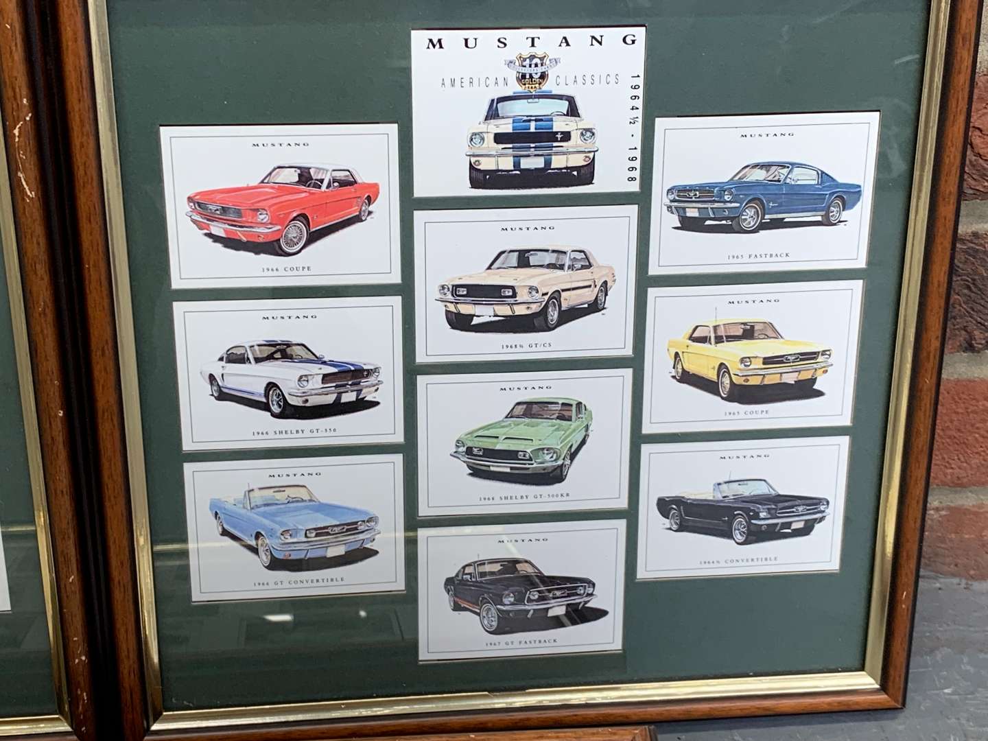<p>Three Framed Motoring Collectors Cards</p>