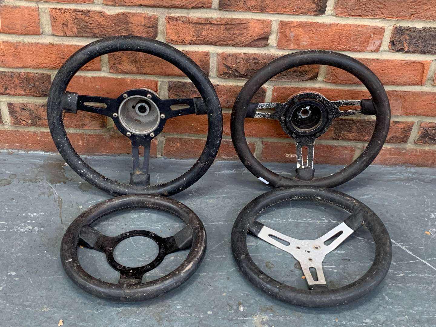 <p>Four Classic Steering Wheels</p>
