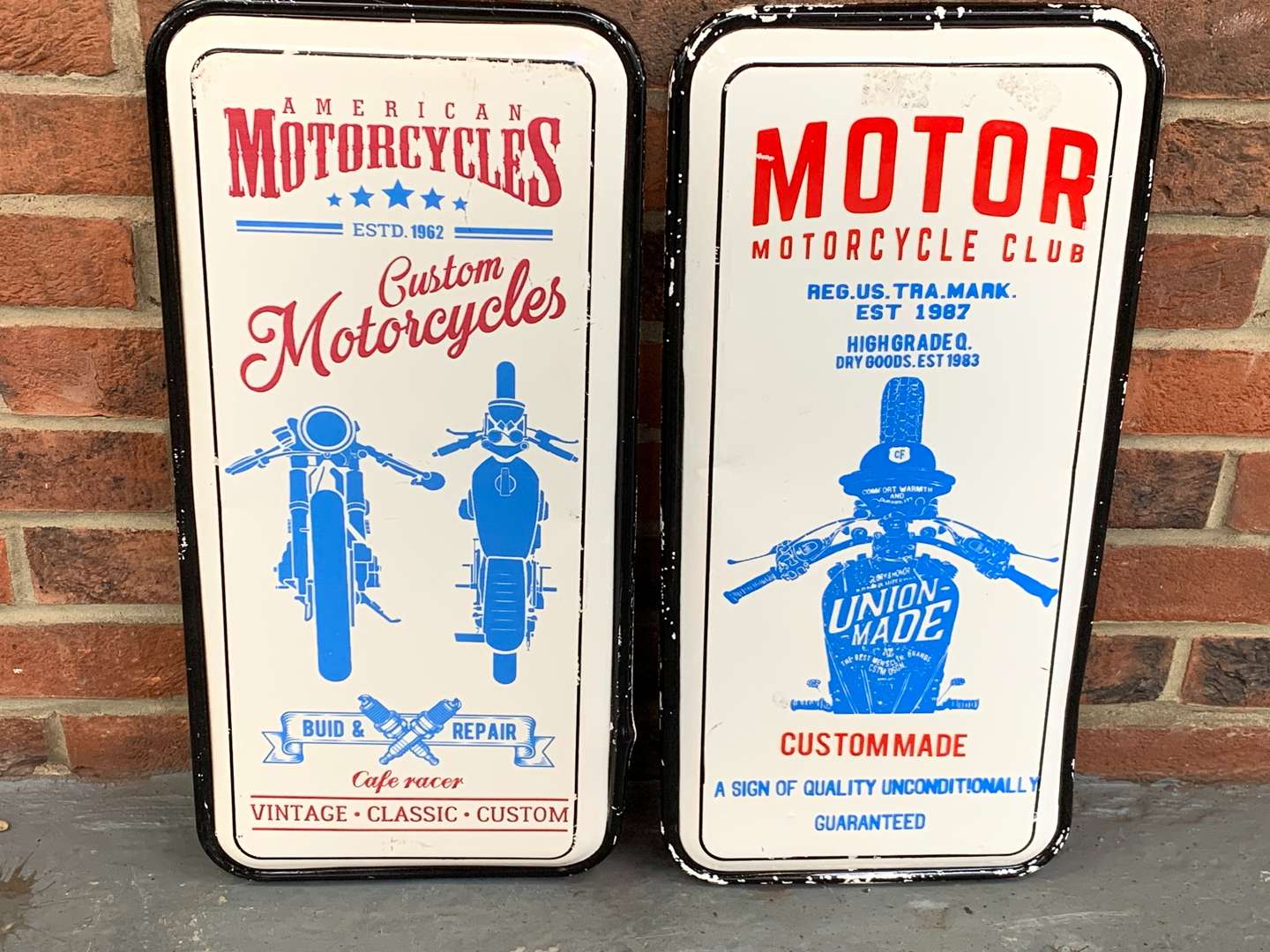 <p>Two Metal Motorcycle Signs</p>