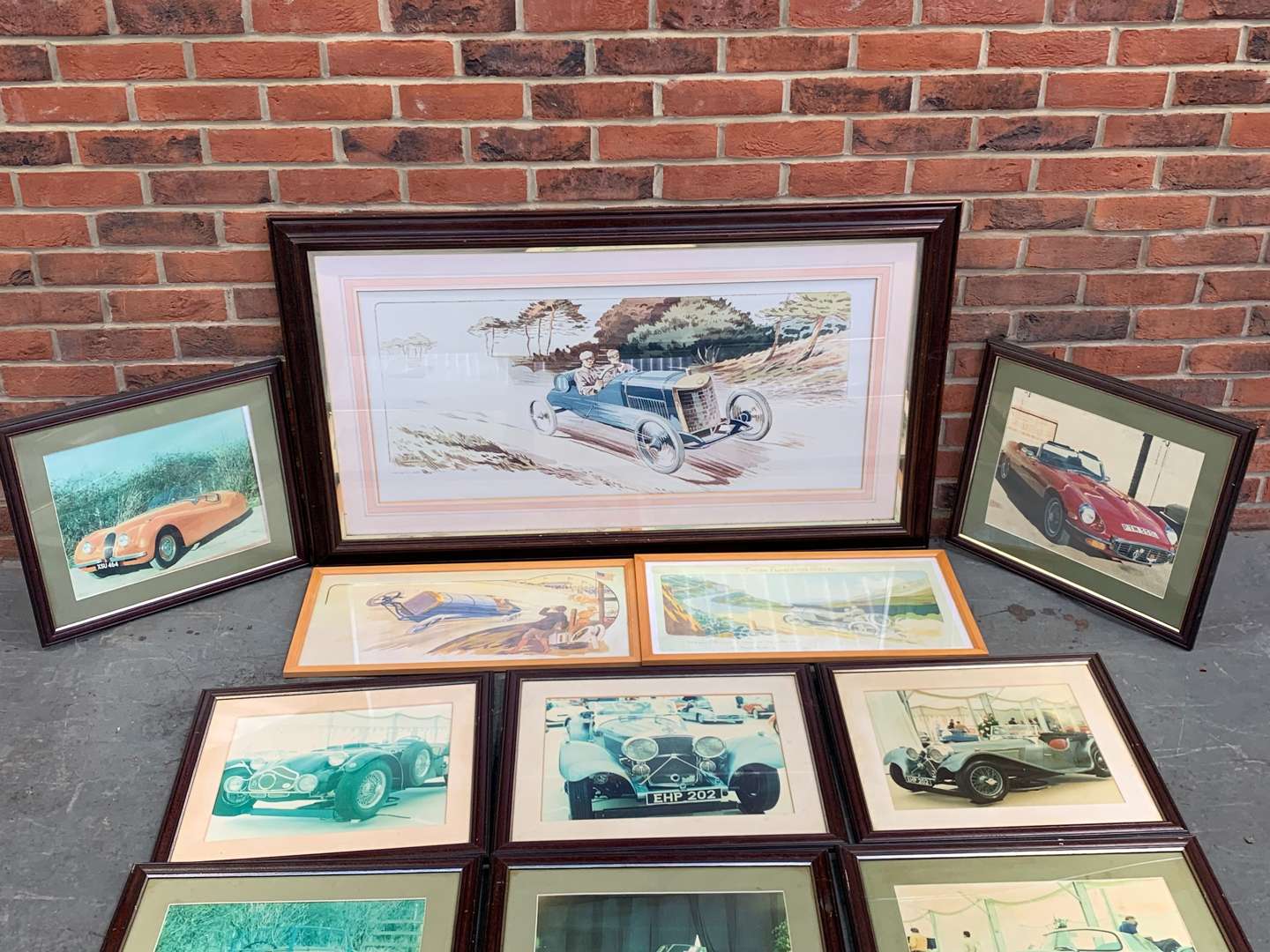 <p>Twelve Framed Classic Car Prints</p>