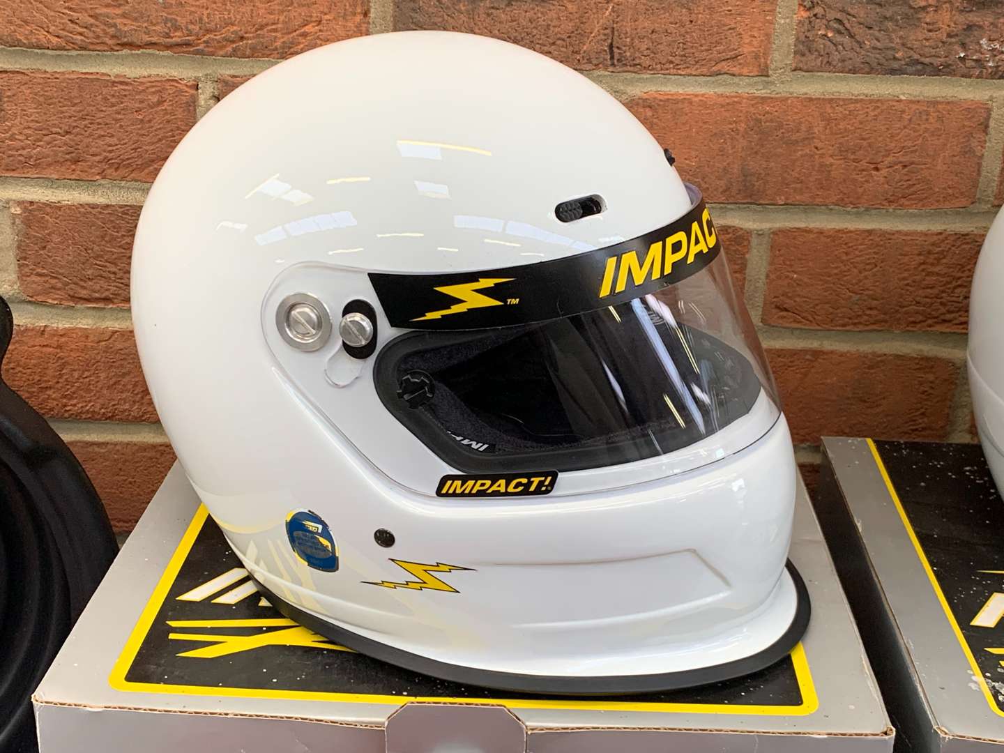 <p>Two Racing Helmets, Various Seat Belt Harnesses, Axle Stands Etc</p>