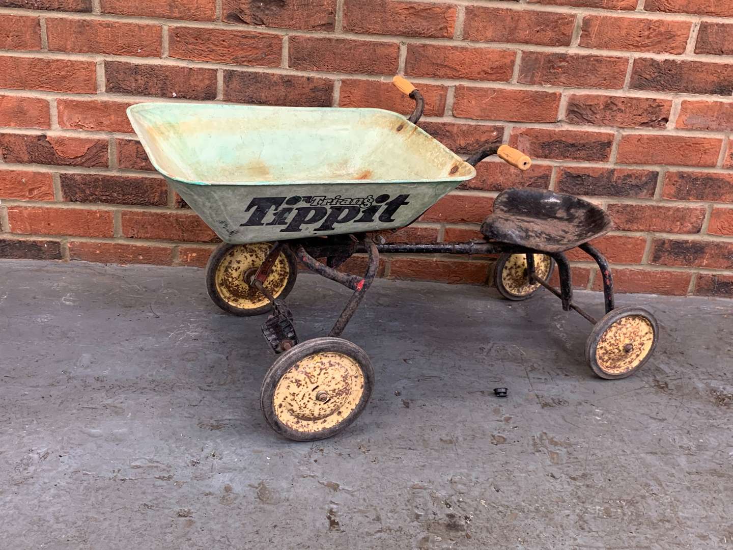 <p>Tri-Ang Childs Tippet Pedal Truck</p>