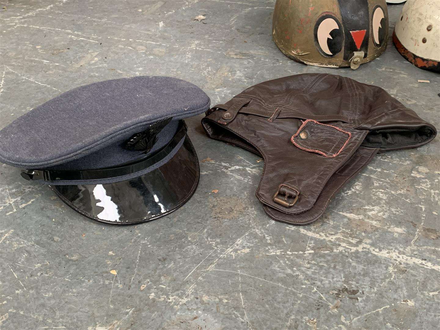 <p>Seven Vintage Racing Helmets, Chauffeurs &amp; Flying Hats&nbsp;</p>