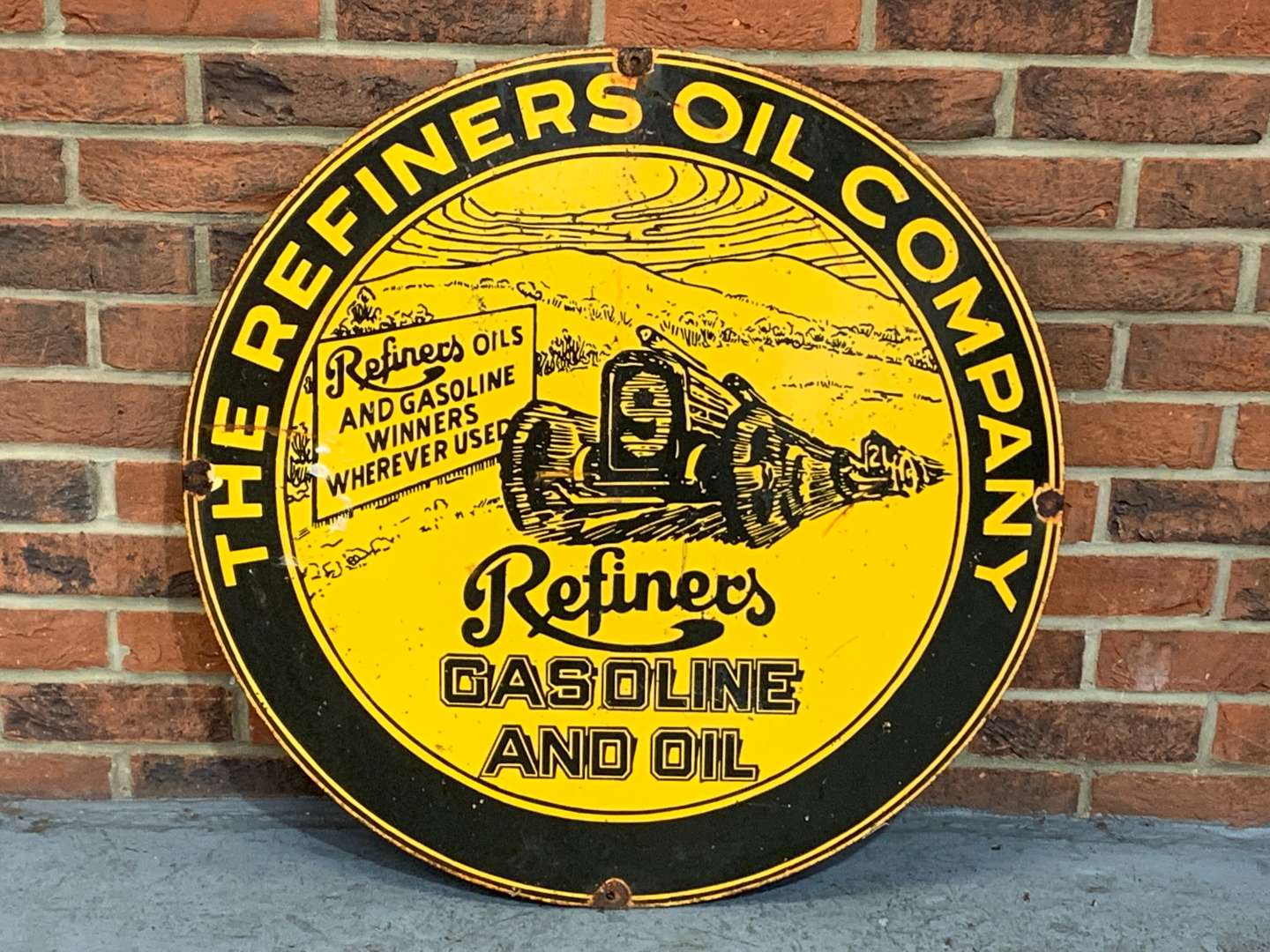 <p>The Refiners Oil Company Circular Enamel Sign</p>