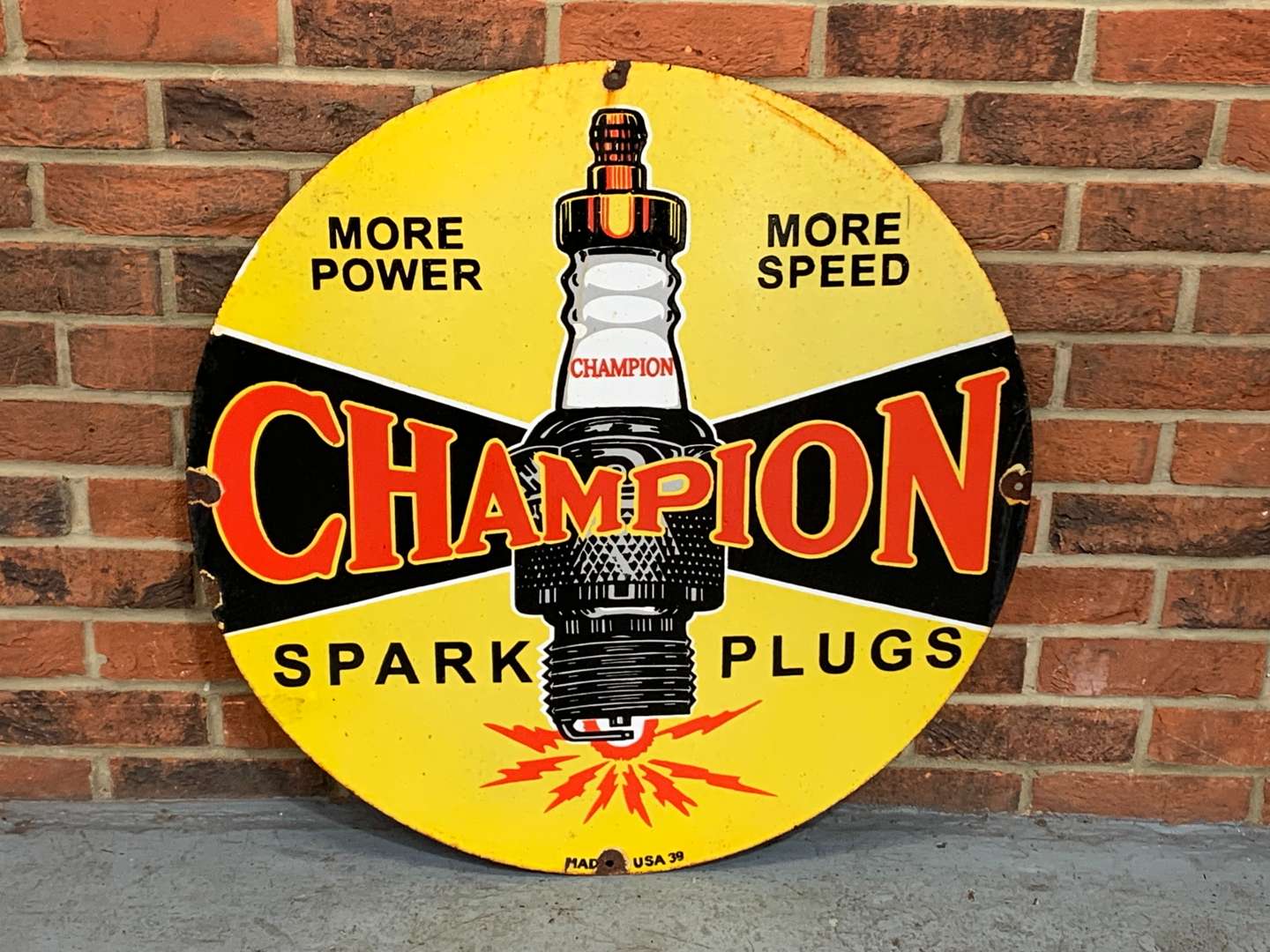 <p>Champion Spark Plug Circular Enamel Sign</p>