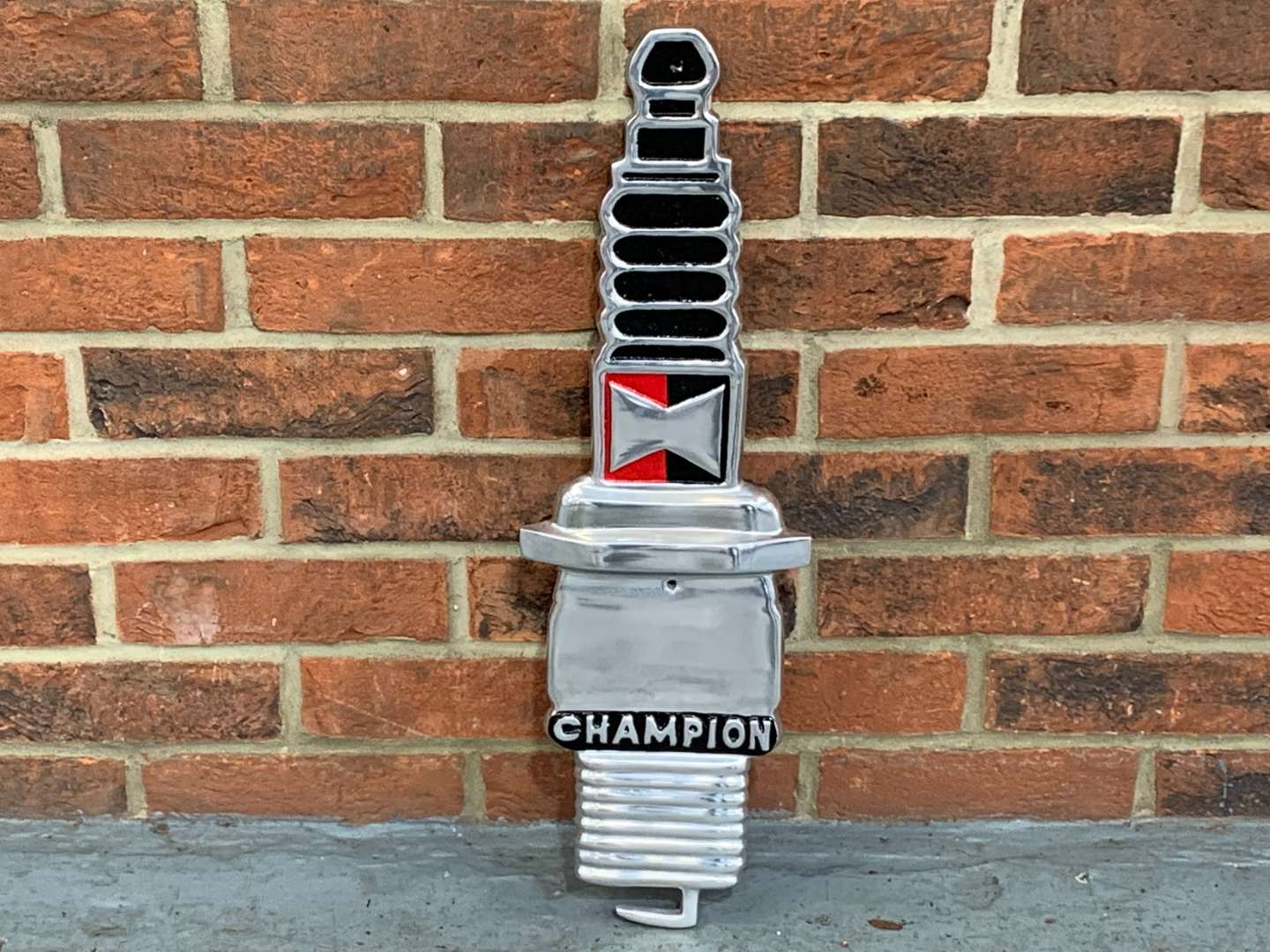<p>Champion Spark Plug Cast Aluminium Sign</p>