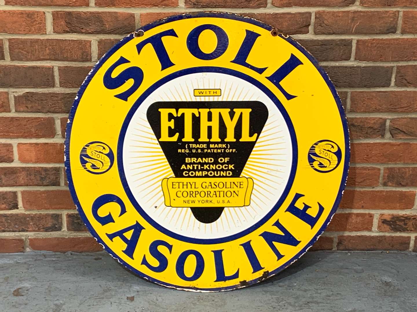 <p>Stoll Gasoline Circular Enamel Sign</p>