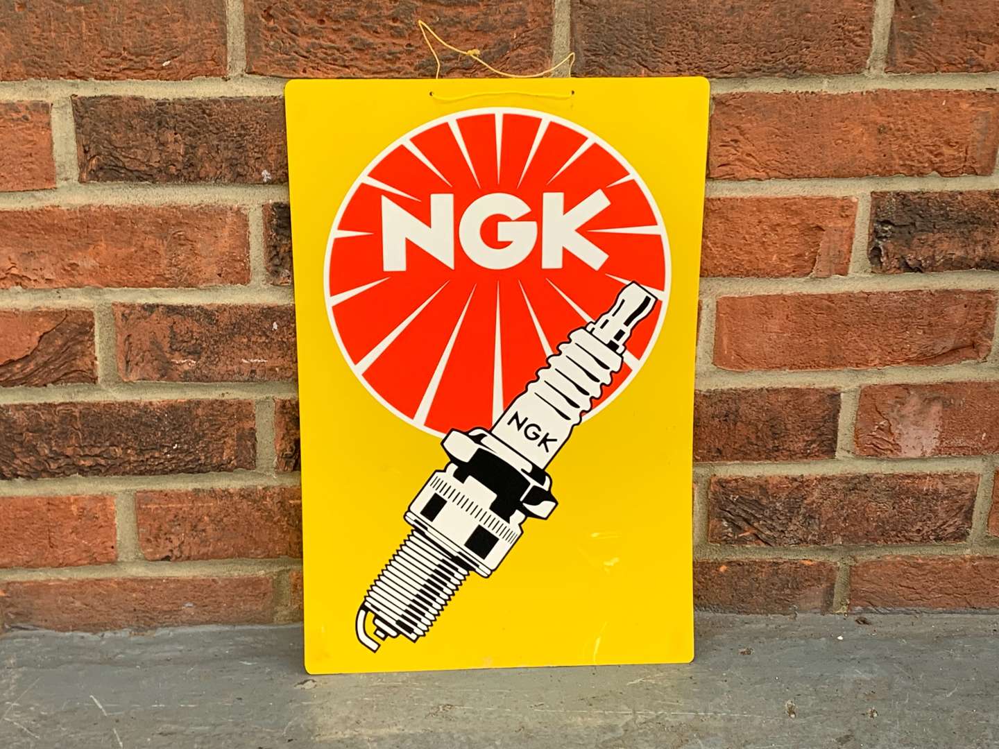 <p>NGK Spark Plug Plastic Sign</p>