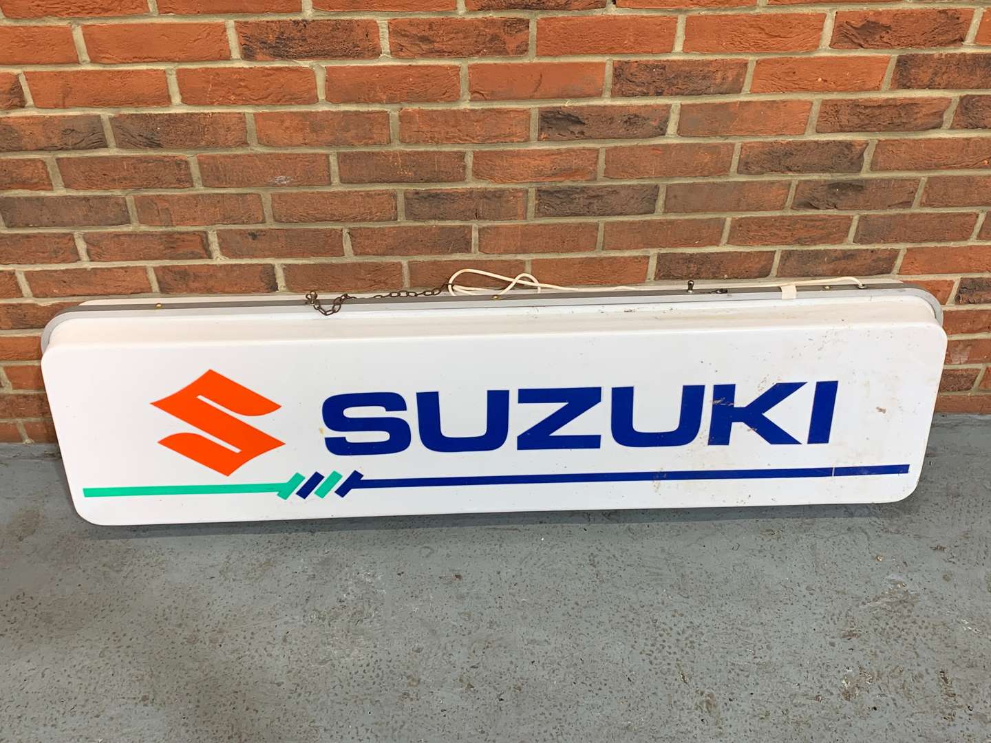 <p>Suzuki Illuminated Dealership Hanging Sign</p>
