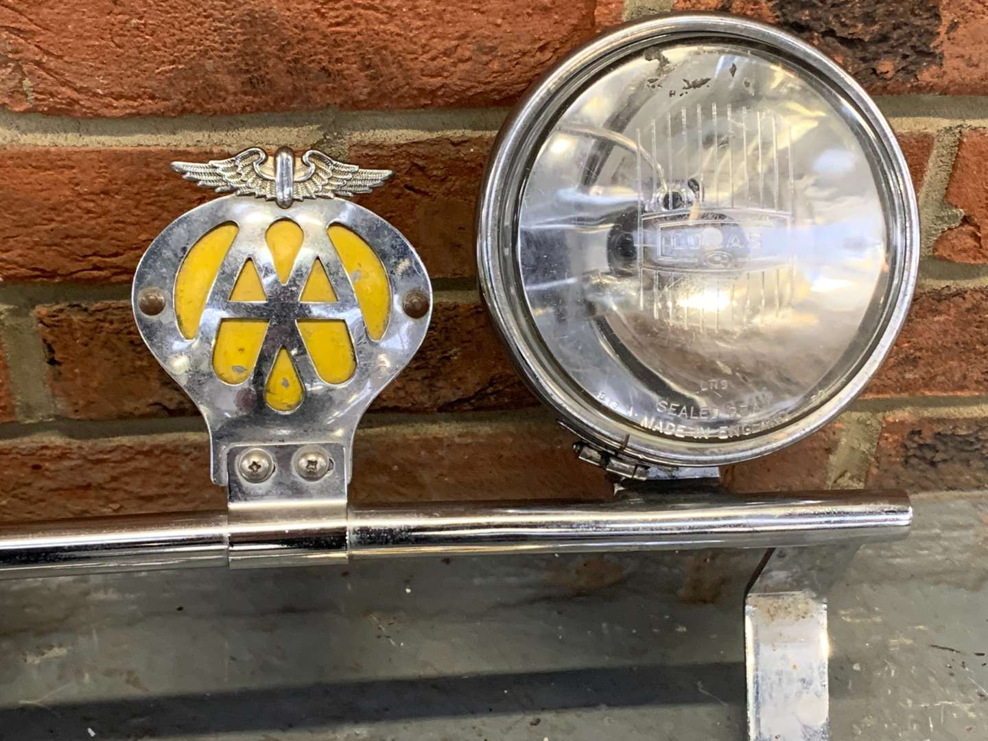 <p>Two Classic Car Badge Bars With Nine Badges and Pair Lucas Lights</p>