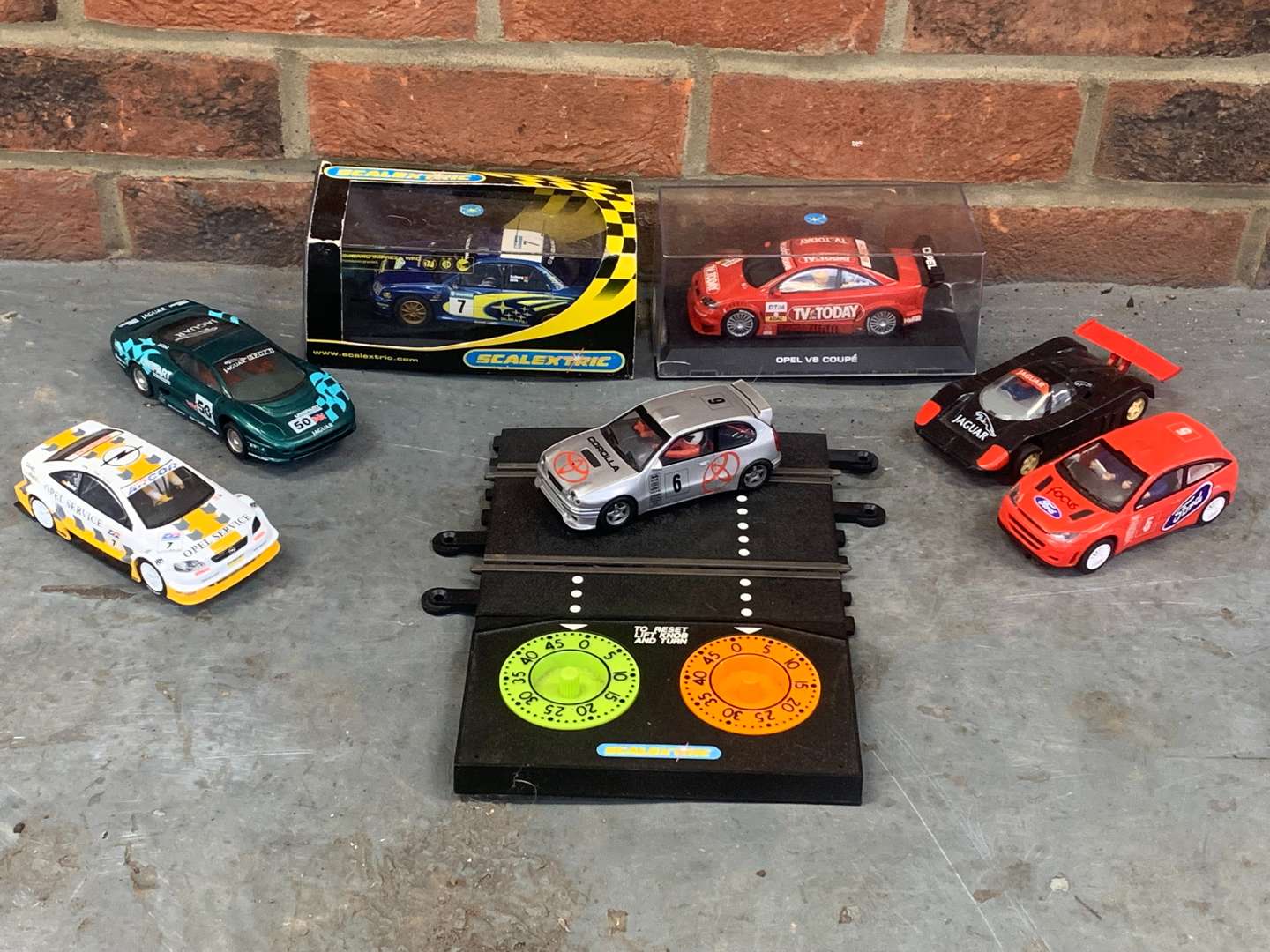 <p>Seven Scalextric Type Cars and Track Timer&nbsp;</p>