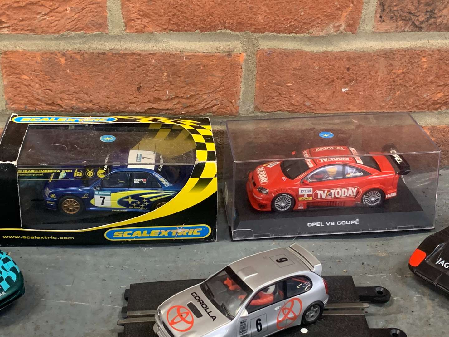 <p>Seven Scalextric Type Cars and Track Timer&nbsp;</p>
