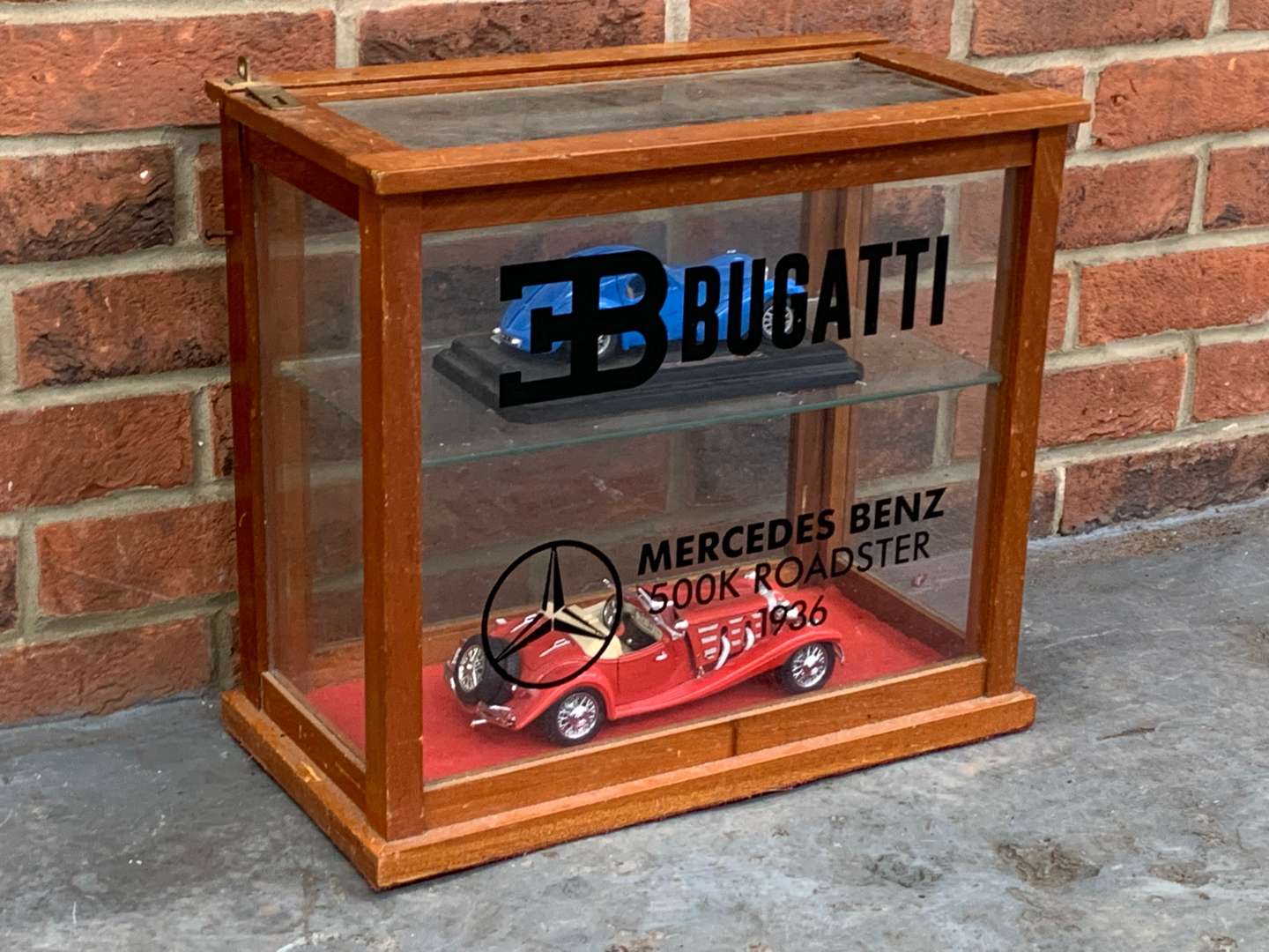 <p>Bugatti and Mercedes Liveried Display Cabinet and Models</p>