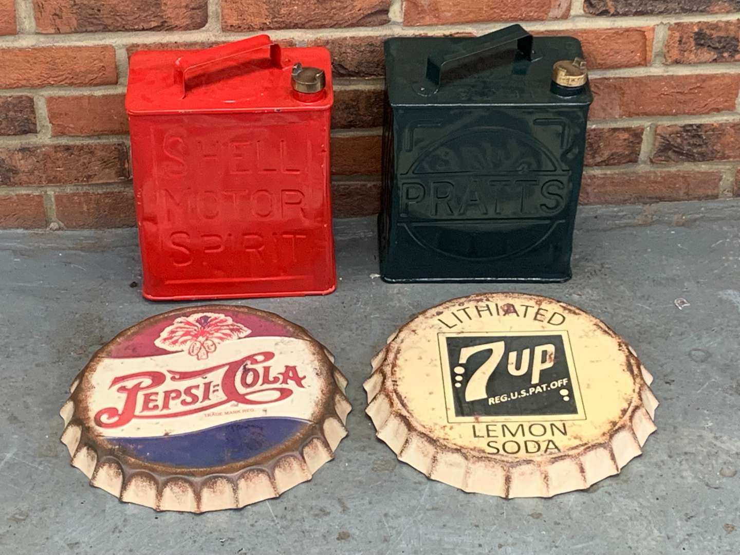 <p>Two Vintage Two Gallon Fuel Cans and Pepsi Cola and 7up Metal Signs (4)</p>
