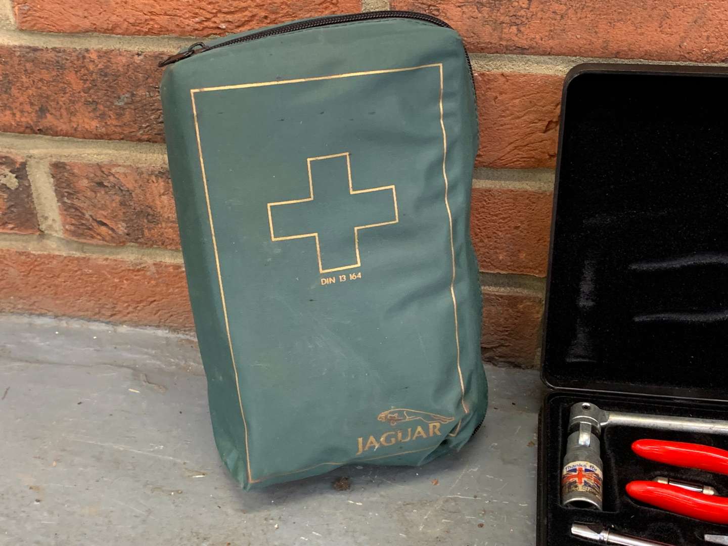 <p>Jaguar Tool Kit, First Aid Case and One Other</p>