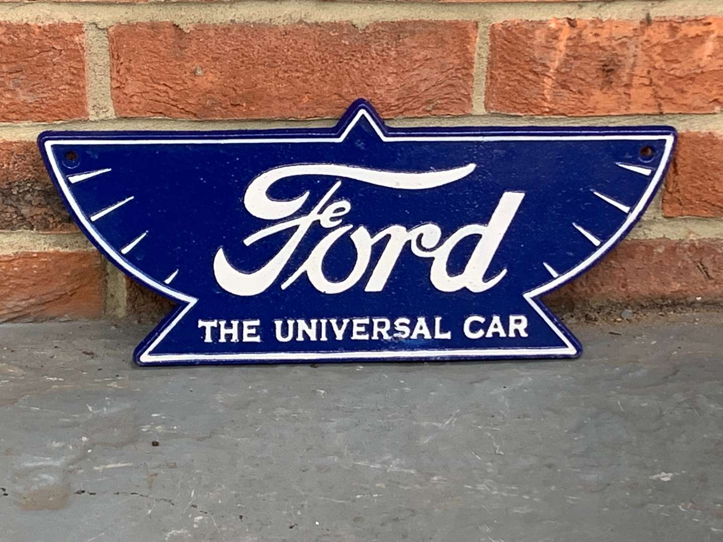 <p>Ford “The Universal Car” Cast Iron Sign</p>