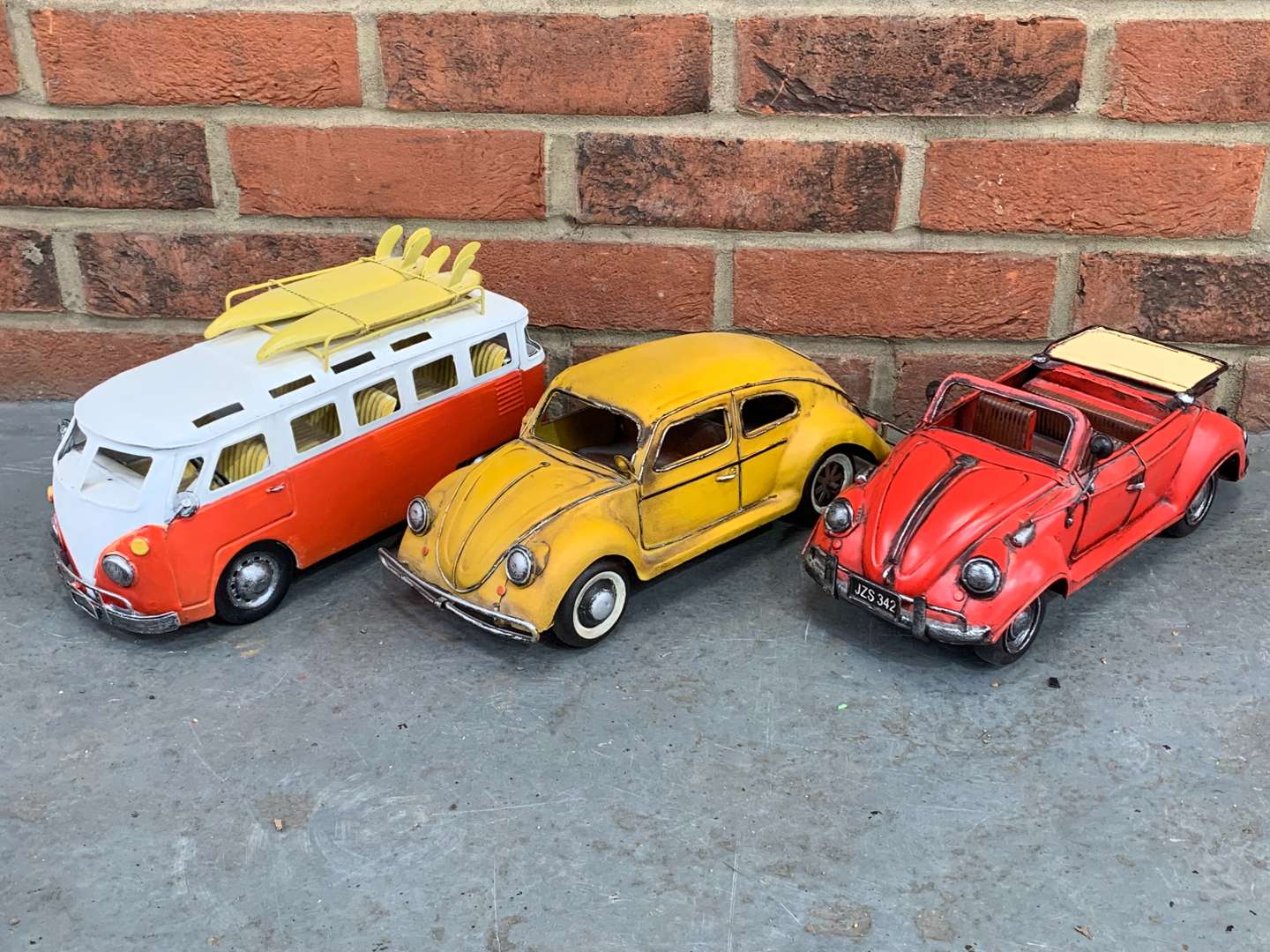 <p>Three Modern Metal VW Model Cars</p>