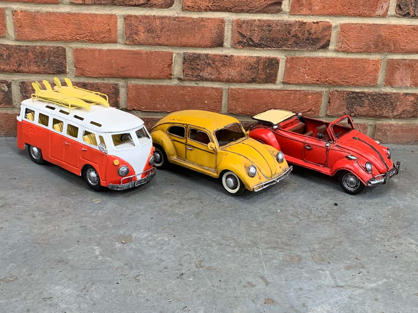 <p>Three Modern Metal VW Model Cars</p>